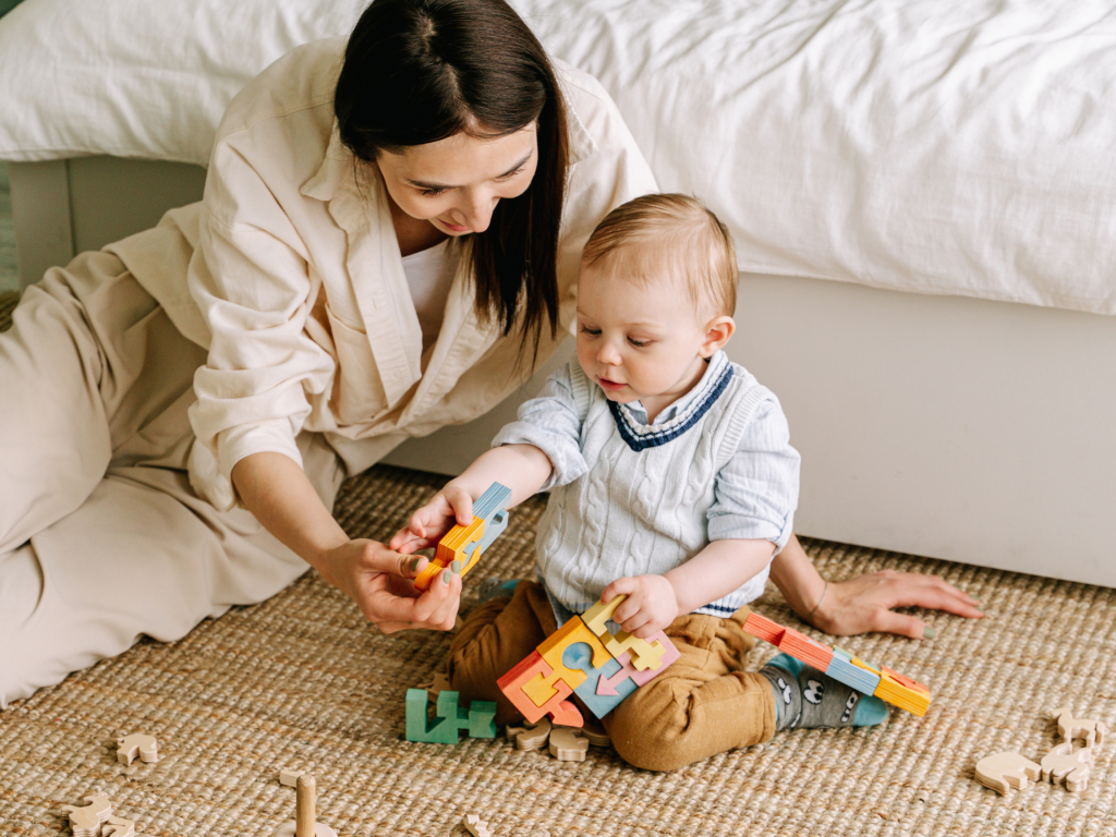 baby reaching with straight arm, fine motor development